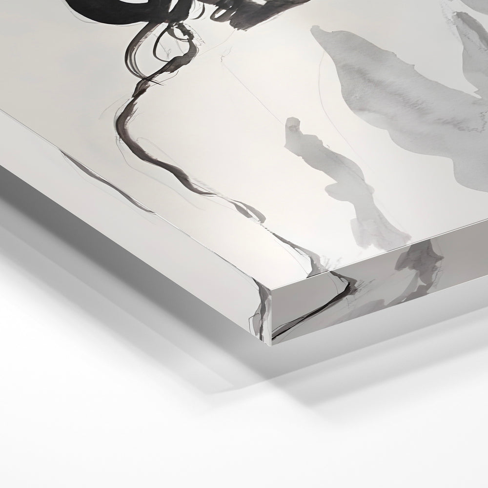 Gros plan de la matière : le tirage sous verre acrylique, tranche transparente visible.