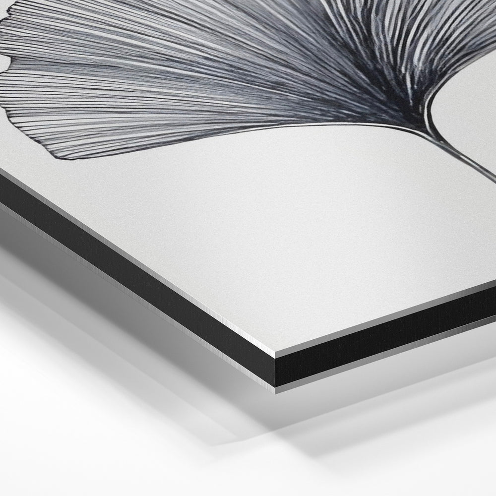 Gros plan de la matière : le tirage contrecollé sur aluminium Dibond mat, tranche visible.