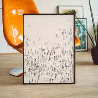 L'impression présentée en poster, sans encadrement, sur un mur neutre.