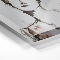 Gros plan de la matière : le tirage sous verre acrylique, tranche transparente visible.