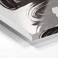 Gros plan de la matière : le tirage sous verre acrylique, tranche transparente visible.