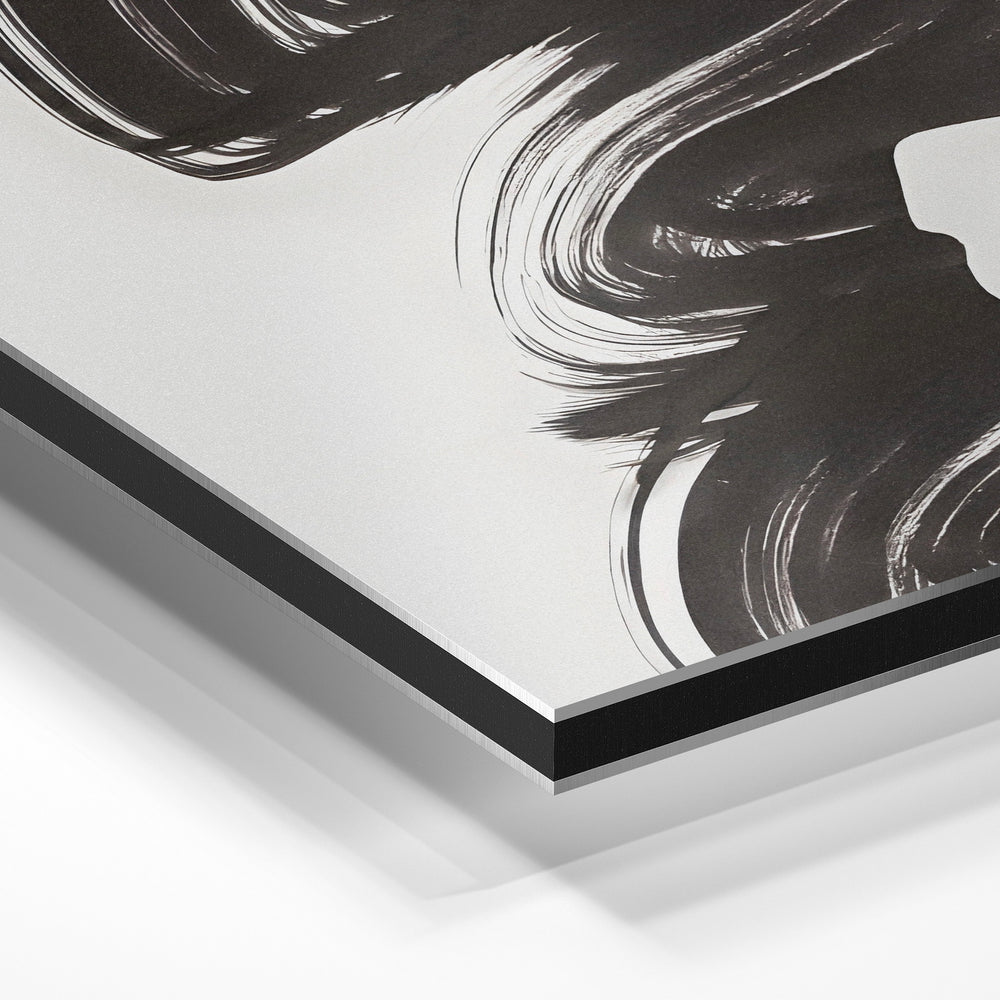 Gros plan de la matière : le tirage contrecollé sur aluminium Dibond mat, tranche visible.
