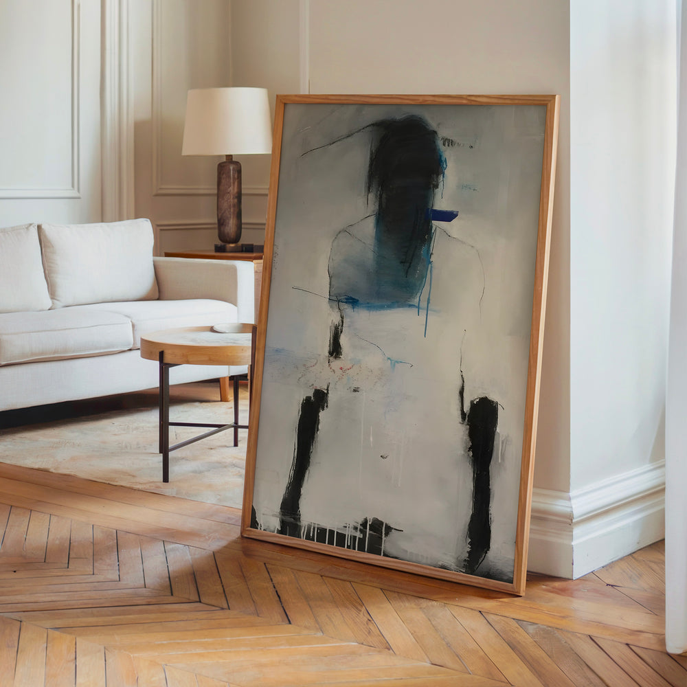 Le tableau accroché en situation dans un intérieur meublé.