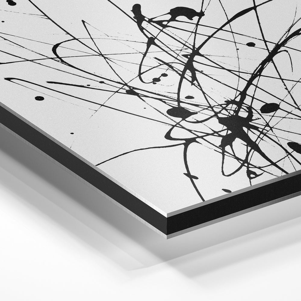 Gros plan de la matière : le tirage contrecollé sur aluminium Dibond mat, tranche visible.