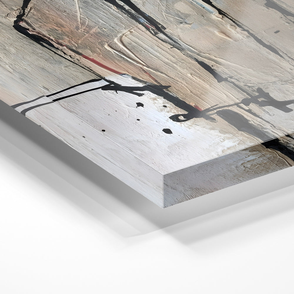 Gros plan de la matière : le tirage sous verre acrylique, tranche transparente visible.