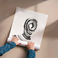 L'impression présentée en poster, sans encadrement, sur un mur neutre.