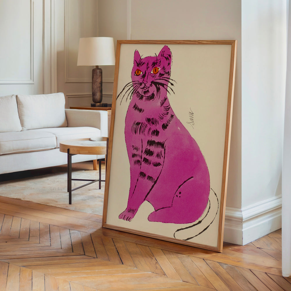Le tableau accroché en situation dans un intérieur meublé.