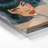Gros plan de la matière : le tirage sous verre acrylique, tranche transparente visible.