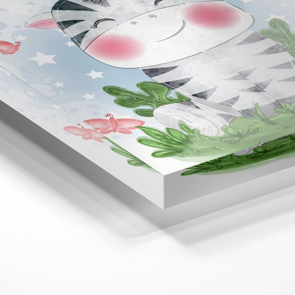 Gros plan de la matière : le tirage sous verre acrylique, tranche transparente visible.