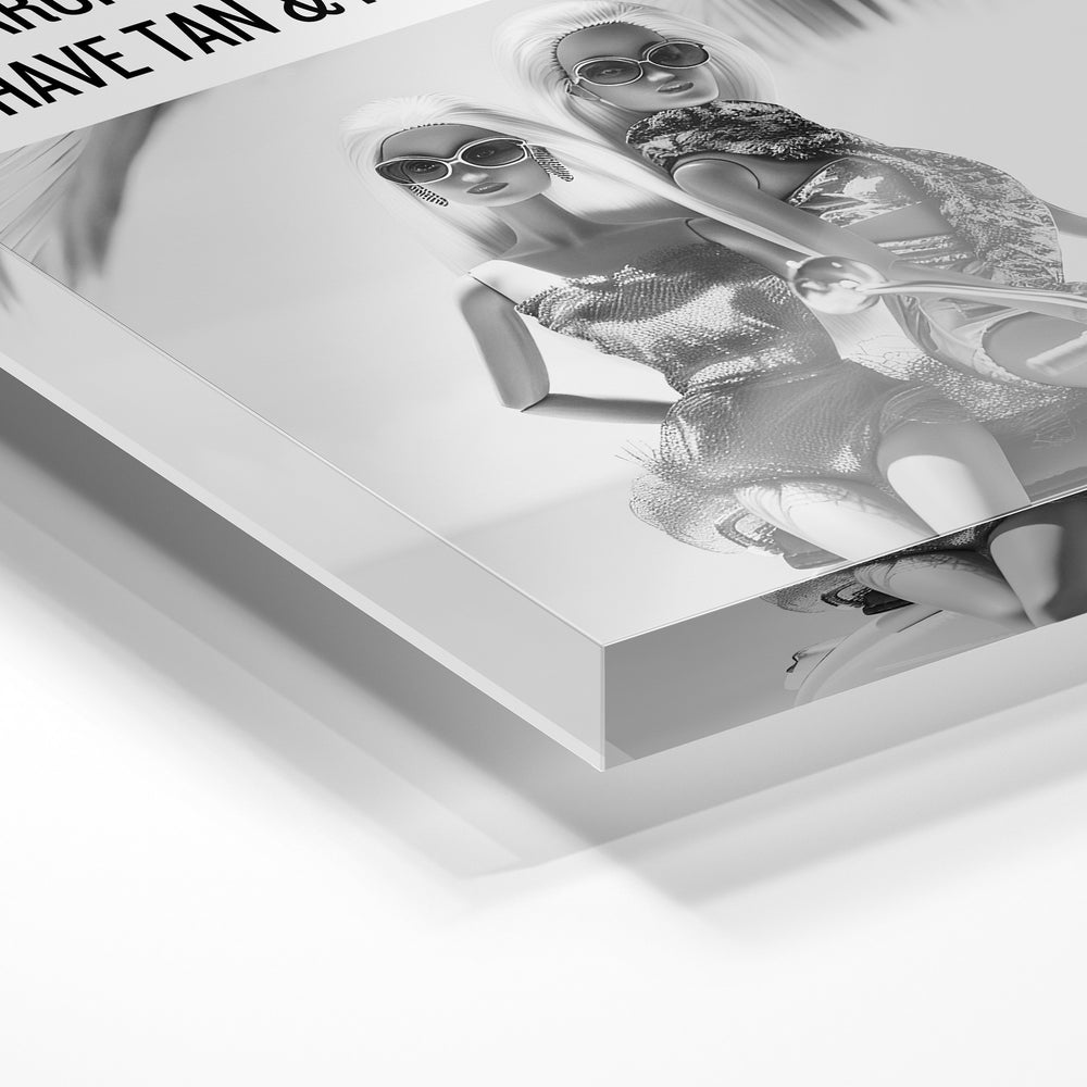 Gros plan de la matière : le tirage sous verre acrylique, tranche transparente visible.