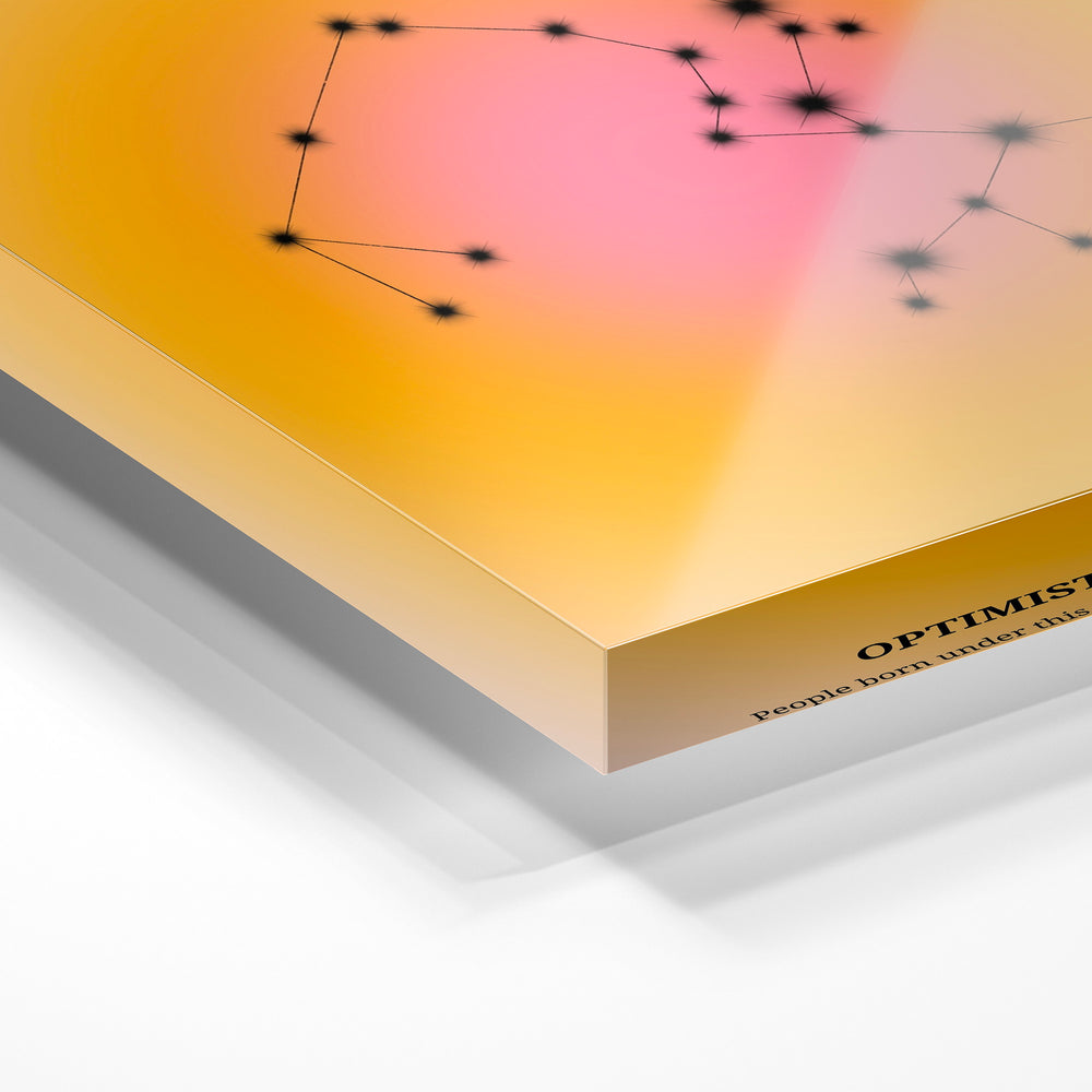 Gros plan de la matière : le tirage sous verre acrylique, tranche transparente visible.
