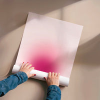 L'impression présentée en poster, sans encadrement, sur un mur neutre.