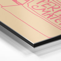 Gros plan de la matière : le tirage contrecollé sur aluminium Dibond mat, tranche visible.