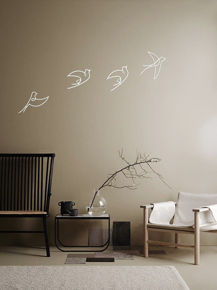 Décorations métals oiseaux blancs