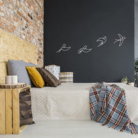 Décorations métals oiseaux blancs