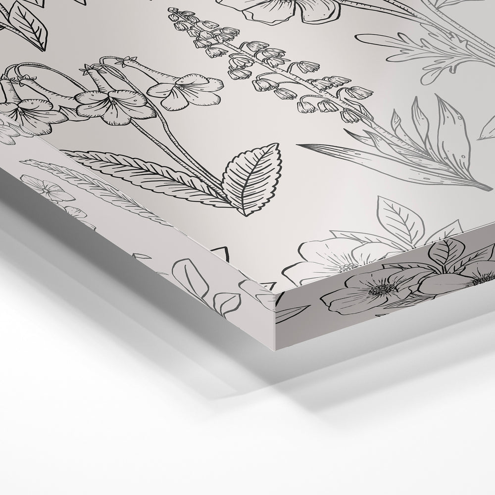 Gros plan de la matière : le tirage sous verre acrylique, tranche transparente visible.