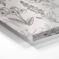Gros plan de la matière : le tirage sous verre acrylique, tranche transparente visible.