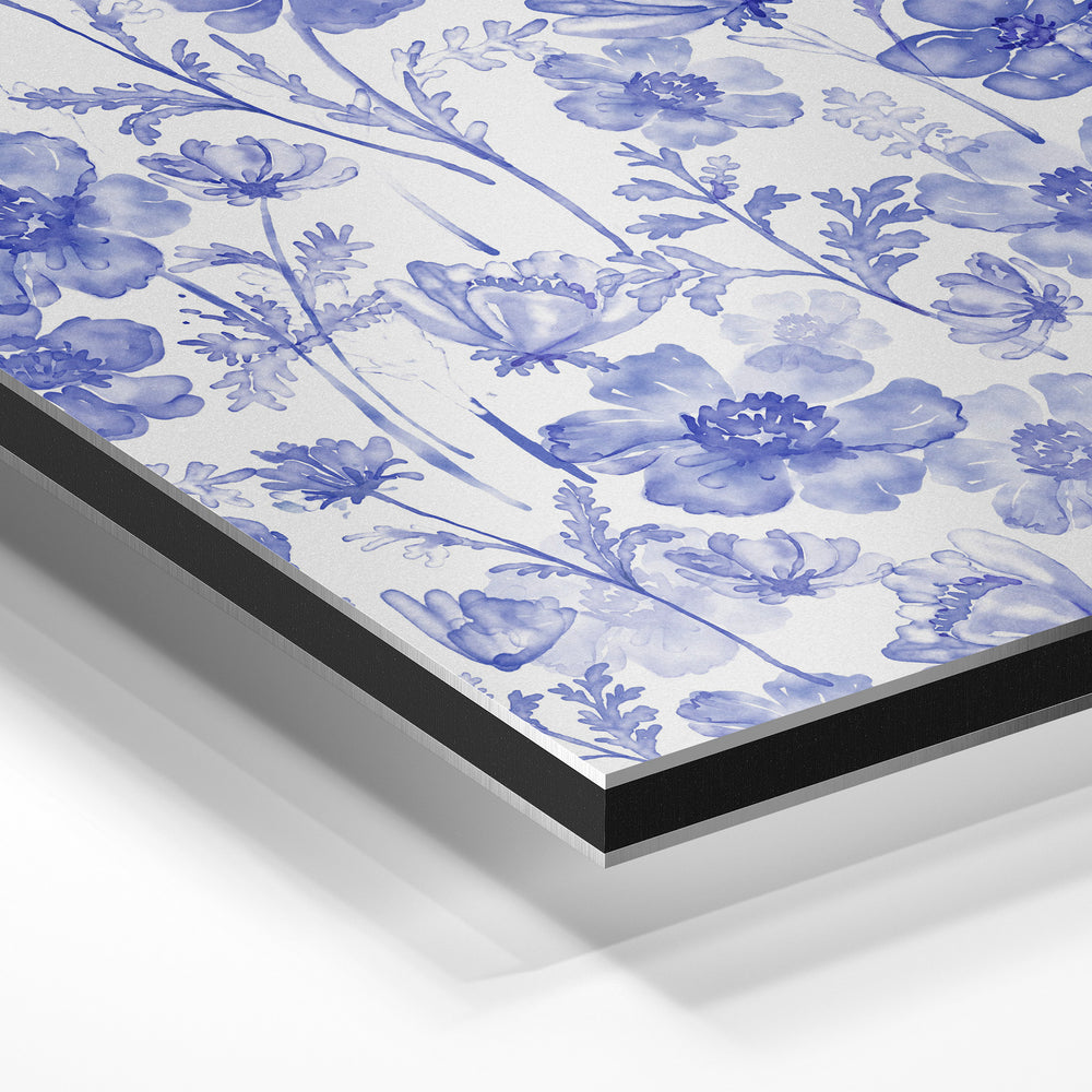 Gros plan de la matière : le tirage contrecollé sur aluminium Dibond mat, tranche visible.