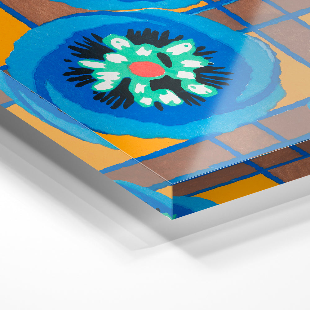 Gros plan de la matière : le tirage sous verre acrylique, tranche transparente visible.