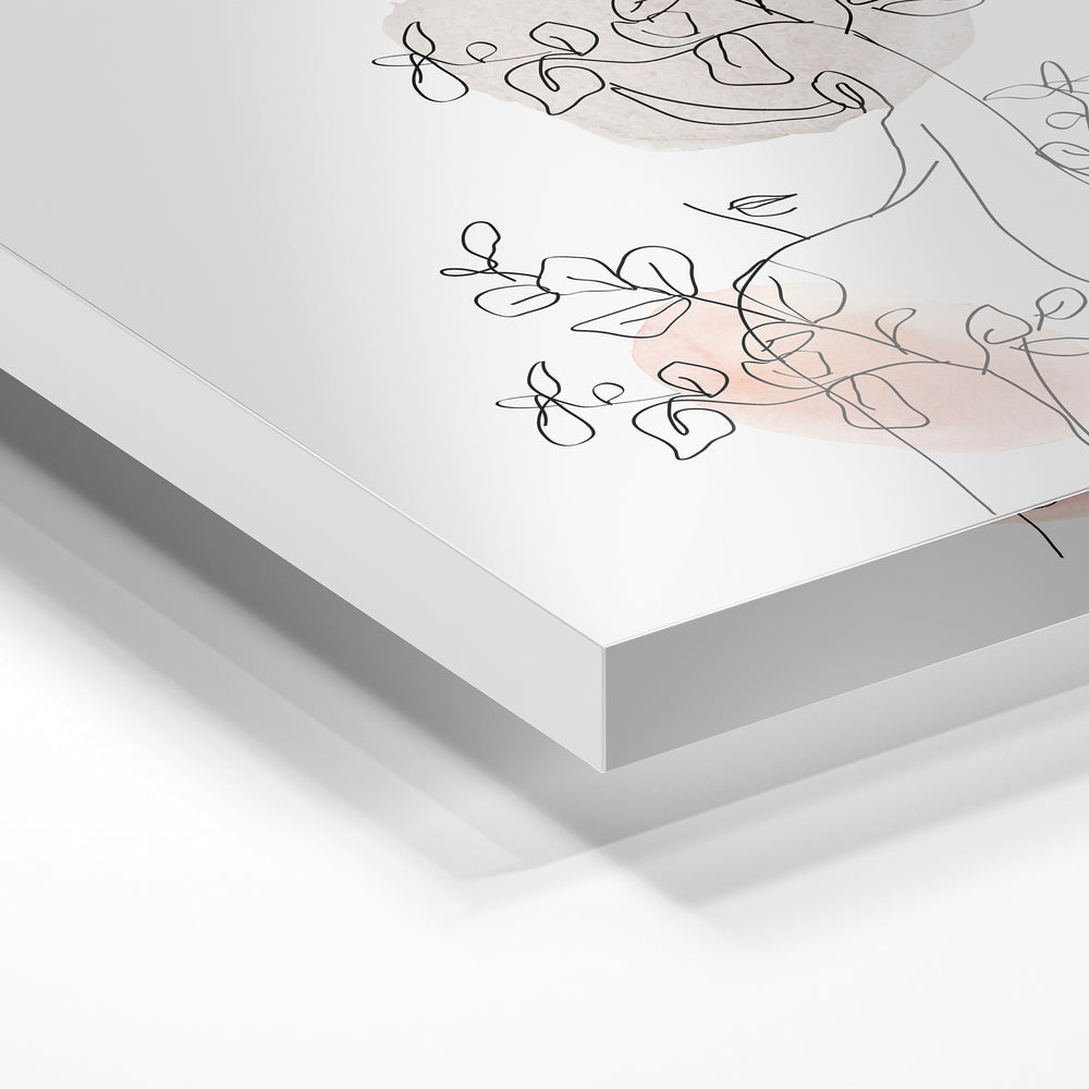 Gros plan de la matière : le tirage sous verre acrylique, tranche transparente visible.