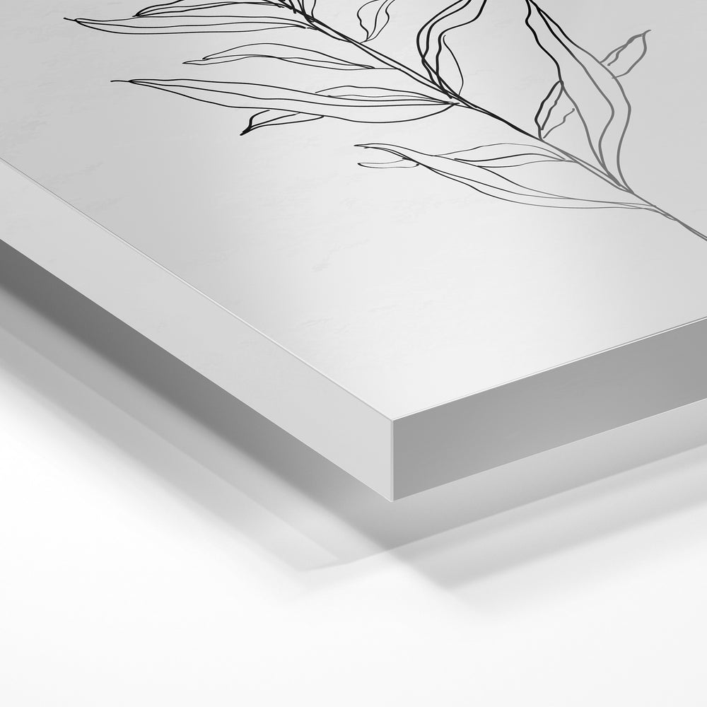 Gros plan de la matière : le tirage sous verre acrylique, tranche transparente visible.