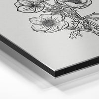 Gros plan de la matière : le tirage contrecollé sur aluminium Dibond mat, tranche visible.