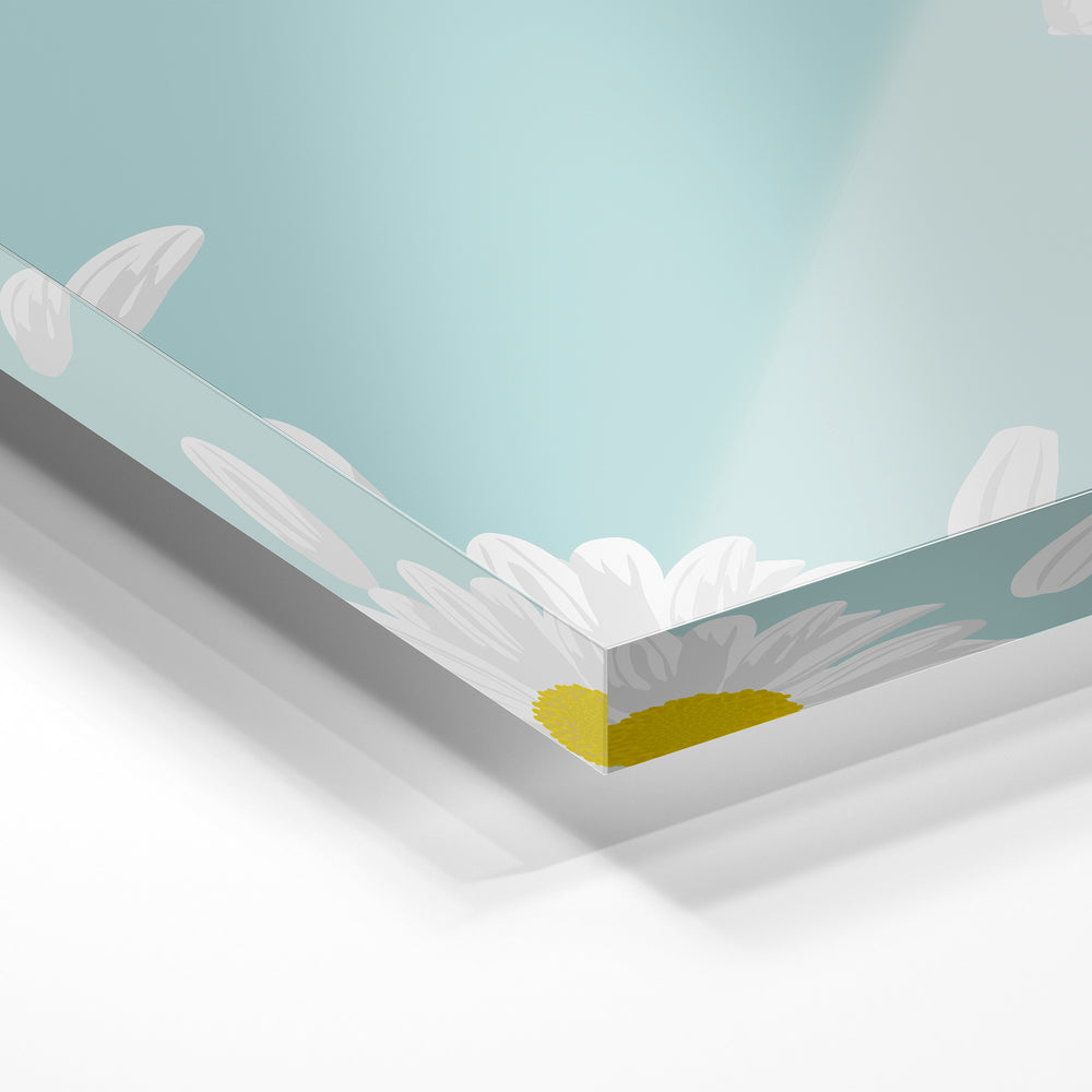 Gros plan de la matière : le tirage sous verre acrylique, tranche transparente visible.