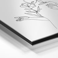 Gros plan du relief : la surépaisseur d'encre en lumière rasante sur aluminium Dibond.