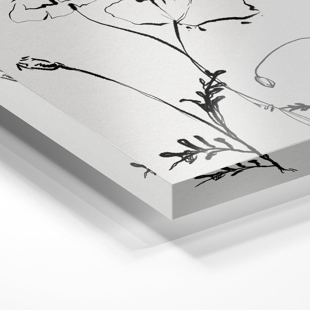 Gros plan de la matière : le tirage sous verre acrylique, tranche transparente visible.
