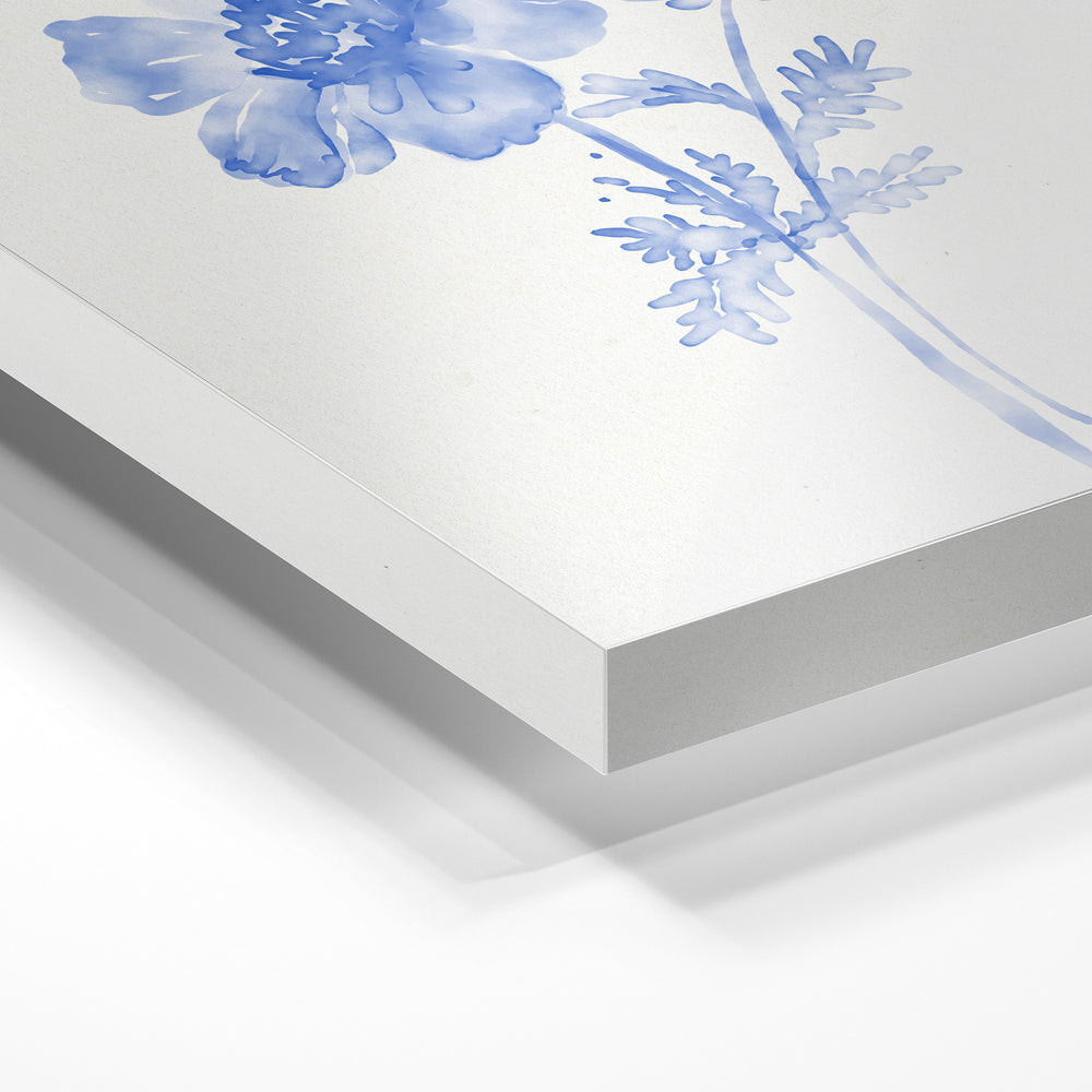 Gros plan de la matière : le tirage sous verre acrylique, tranche transparente visible.