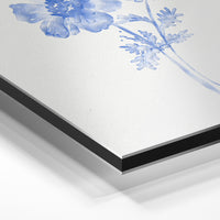 Gros plan du relief : la surépaisseur d'encre en lumière rasante sur aluminium Dibond.