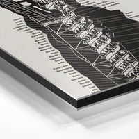Gros plan de la matière : le tirage contrecollé sur aluminium Dibond mat, tranche visible.