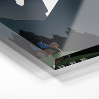 Gros plan de la matière : le tirage sous verre acrylique, tranche transparente visible.