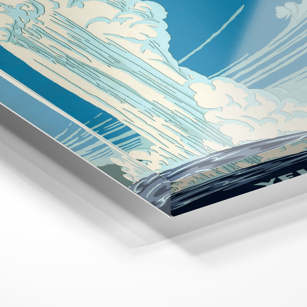 Gros plan de la matière : le tirage sous verre acrylique, tranche transparente visible.