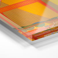 Gros plan de la matière : le tirage sous verre acrylique, tranche transparente visible.