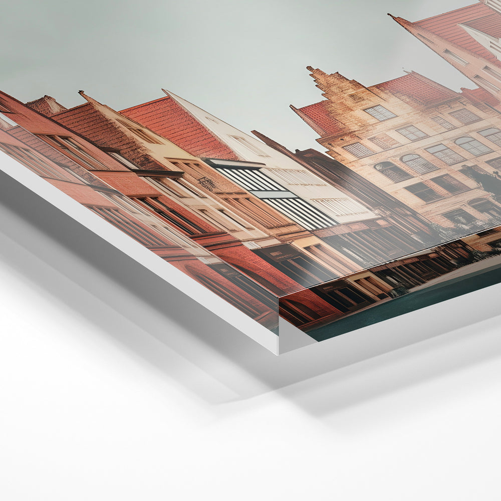 Gros plan de la matière : le tirage sous verre acrylique, tranche transparente visible.