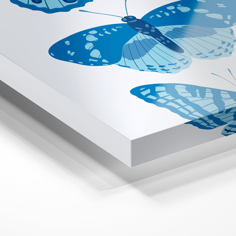Gros plan de la matière : le tirage sous verre acrylique, tranche transparente visible.