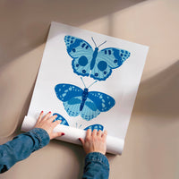 L'impression présentée en poster, sans encadrement, sur un mur neutre.