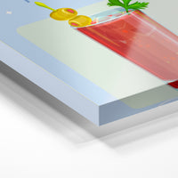 Gros plan de la matière : le tirage sous verre acrylique, tranche transparente visible.